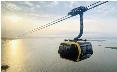 Cabin cáp treo di chuyển trên đường cáp